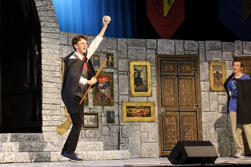 Students perform onstage